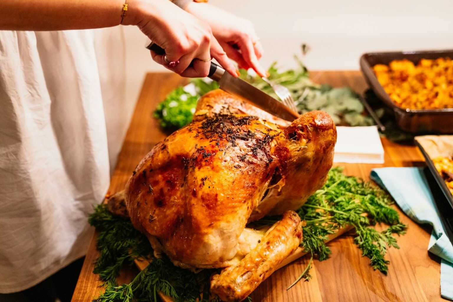 Carving a roast turkey for Thanksgiving dinner