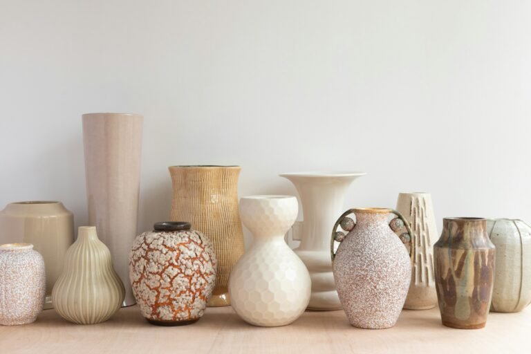 Vase set with handles style ceramic vases in neutral tones on wood
